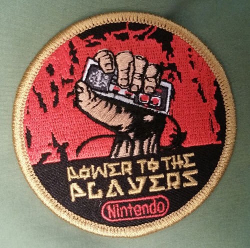 Super cool vintage Nintendo patch that says "Power To The Players"