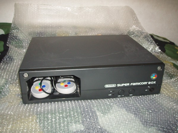 Super Famicom Box from the front with controllers