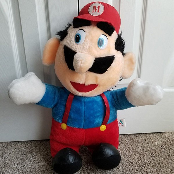 34 inches tall Super Mario doll in good condition