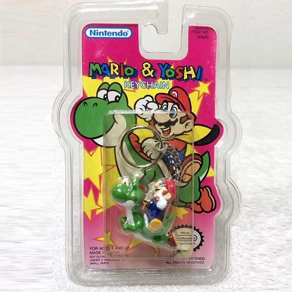 Round up your retro gamer style with this Mario & Yoshi Keychain