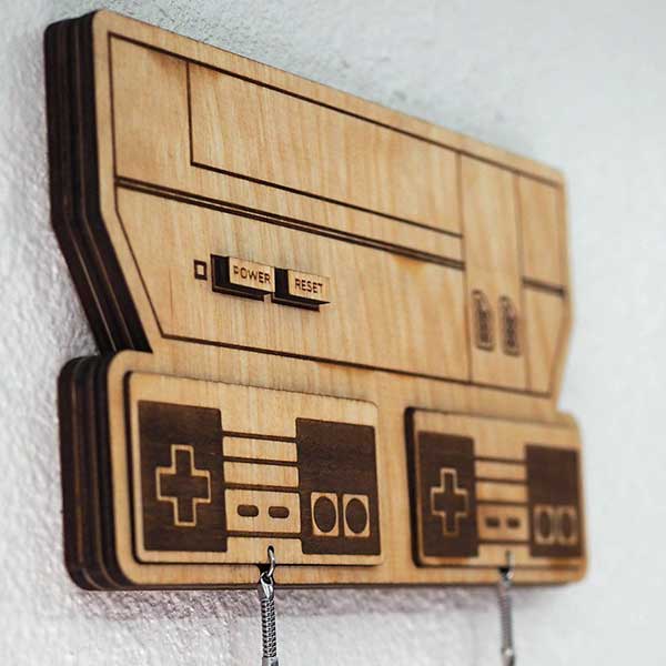 The NES inspired key holde ris made from wood and looks just great and natural