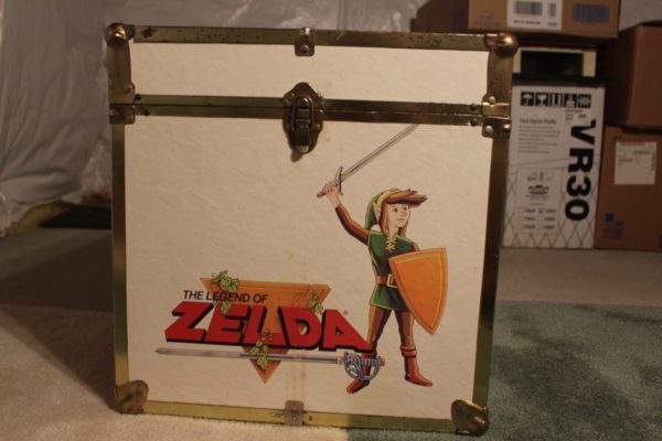 The side of the vintage Nintendo toy chest with the Zelda artwork