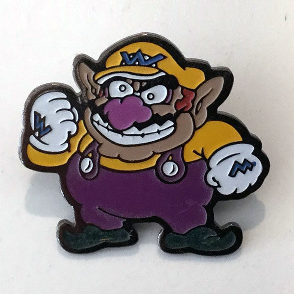 Some show edge with the Vintage Wario Lapel Pin